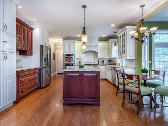Chandelier, Dining room, Interior, Kitchen, Pendant Lights, Recessed Lighting, Stainless Steel Appliances, Wood Texture Flooring