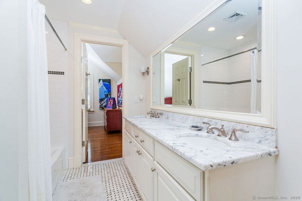 Bathroom, Dual Sink Vanities, Interior, Recessed Lighting, Wood Texture Flooring