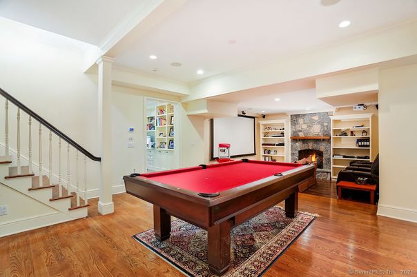 Billiard Table, Fireplace, Game Room, Interior, Recessed Lighting, Stone Walls, Wood Texture Flooring