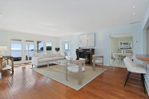 Dining room, Fireplace, Interior, Living room, Recessed Lighting, Wood Texture Flooring