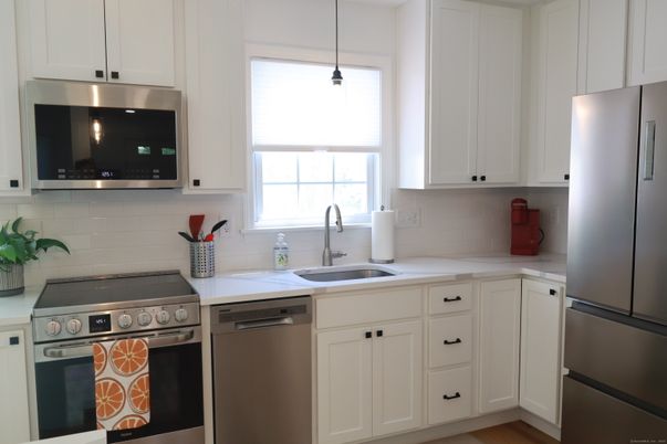 Interior, Kitchen, Pendant Lights, Stainless Steel Appliances, Wood Texture Flooring