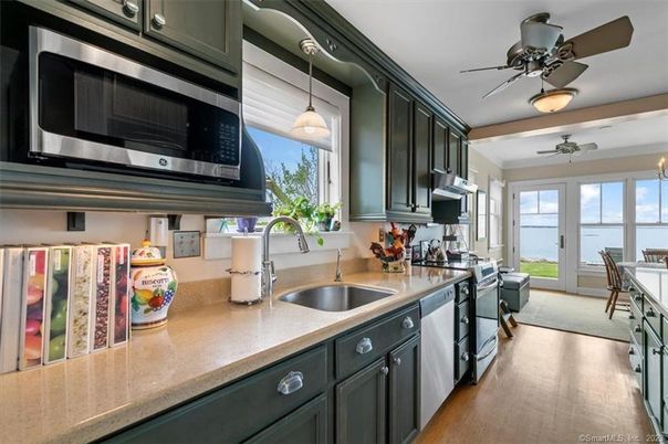 Dining room, Interior, Kitchen, Pendant Lights, Stainless Steel Appliances, Wood Texture Flooring