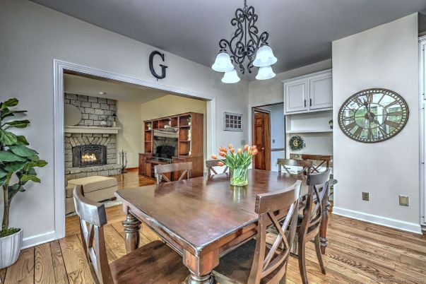 Chandelier, Dining room, Fireplace, Interior, Living room, Wood Texture Flooring