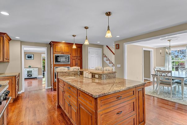 Chandelier, Dining room, Interior, Kitchen, Pendant Lights, Recessed Lighting, Stainless Steel Appliances, Wood Texture Flooring