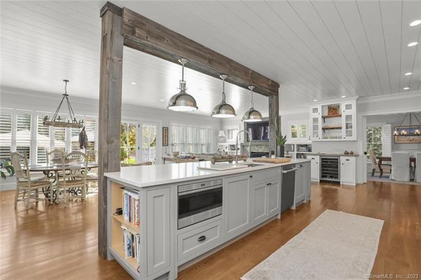 Dining room, Interior, Kitchen, Pendant Lights, Recessed Lighting, Stainless Steel Appliances, Wood Texture Flooring