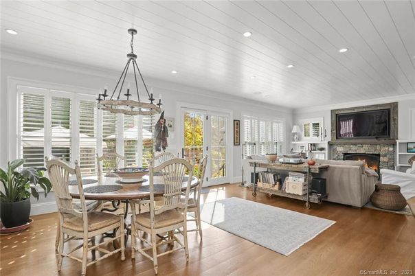 Dining room, Fireplace, Interior, Living room, Pendant Lights, Recessed Lighting, Wood Texture Flooring
