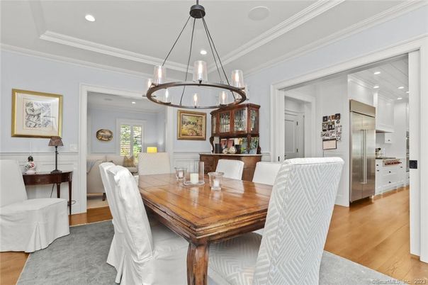 Chandelier, Dining room, Interior, Kitchen, Pendant Lights, Recessed Lighting, Stainless Steel Appliances, Wood Texture Flooring