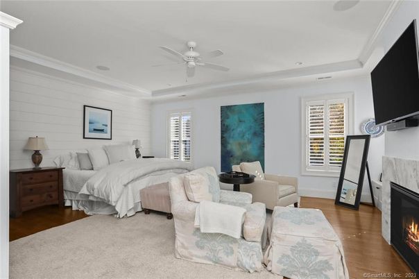 Bedroom, Fireplace, Interior, Recessed Lighting, Wood Texture Flooring