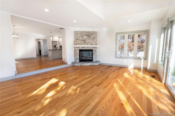 Empty room, Fireplace, Interior, Pendant Lights, Recessed Lighting, Wood Texture Flooring