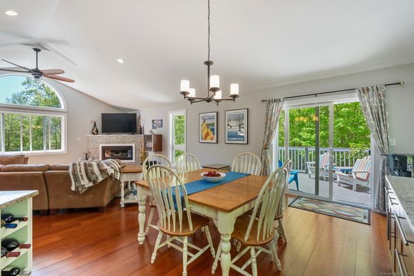 Chandelier, Dining room, Fireplace, Interior, Living room, Recessed Lighting, Wood Texture Flooring