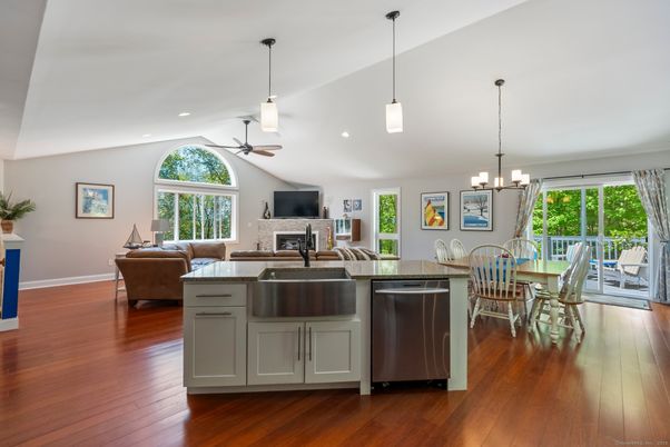 Chandelier, Dining room, Fireplace, Interior, Kitchen, Living room, Pendant Lights, Recessed Lighting, Wood Texture Flooring