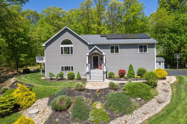 Exterior, Facade, Solar Panels, Raised Ranch