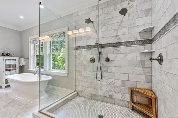 Bathroom, Free Standing Baths, Glass Shower, Interior, Marble, Marble Walls, Pendant Lights, Recessed Lighting
