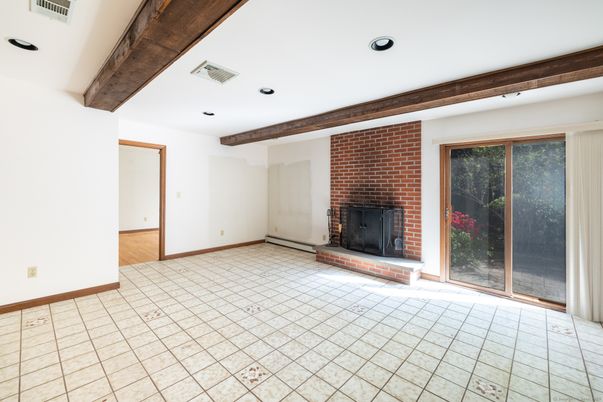 Empty room, Fireplace, Interior, Recessed Lighting, Stone Walls, Wooden Beams