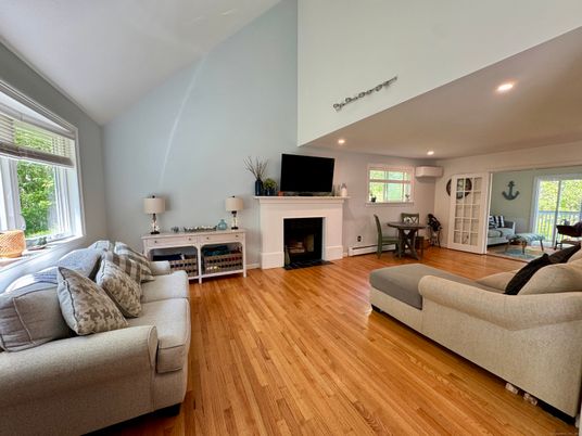Dining room, Fireplace, Interior, Living room, Recessed Lighting, Wood Texture Flooring