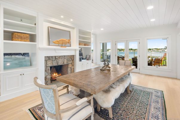 Dining room, Fireplace, Interior, Recessed Lighting, Water, Wood Texture Flooring