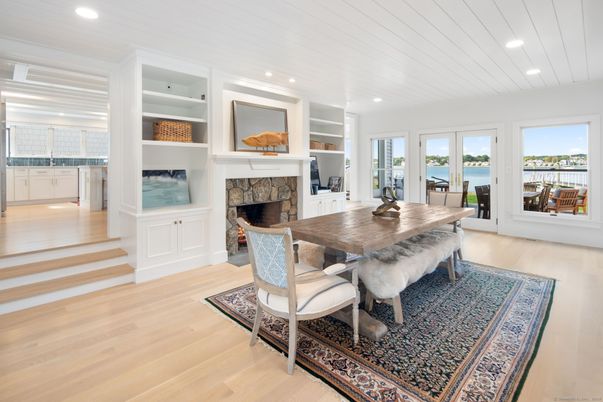 Dining room, Fireplace, Interior, Recessed Lighting, Water, Wood Texture Flooring