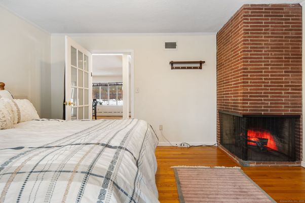 Bedroom, Fireplace, Interior, Stone Walls, Wood Texture Flooring