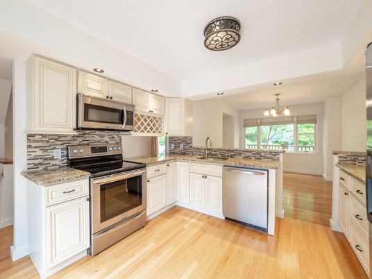 Chandelier, Interior, Kitchen, Recessed Lighting, Stainless Steel Appliances, Wood Texture Flooring