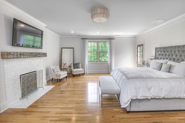 Bedroom, Fireplace, Interior, Recessed Lighting, Wood Texture Flooring