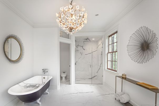 Bathroom, Chandelier, Free Standing Baths, Glass Shower, Interior, Marble, Marble Walls, Recessed Lighting