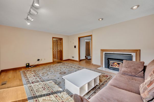 Fireplace, Interior, Living room, Recessed Lighting, Wood Texture Flooring