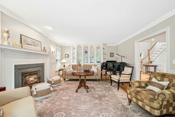 Fireplace, Interior, Living room, Piano, Recessed Lighting, Wood Texture Flooring