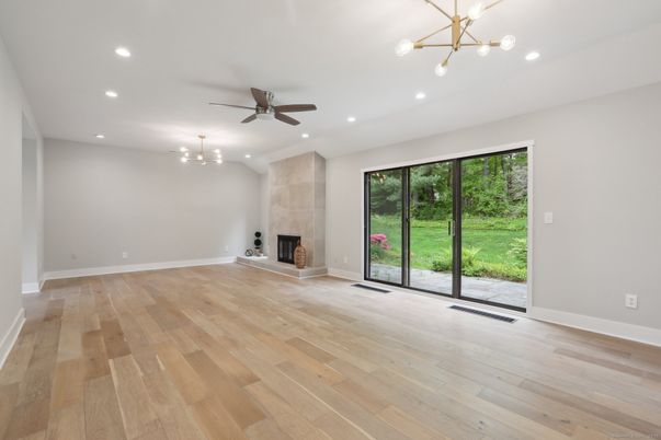 Empty room, Fireplace, Interior, Pendant Lights, Recessed Lighting, Wood Texture Flooring