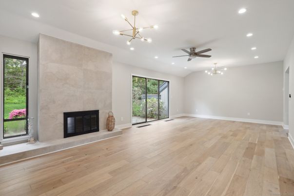 Empty room, Fireplace, Interior, Pendant Lights, Recessed Lighting, Wood Texture Flooring