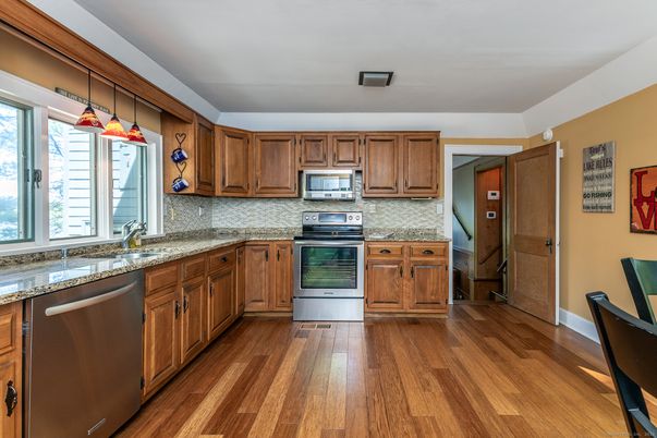 Interior, Kitchen, Pendant Lights, Stainless Steel Appliances, Wood Texture Flooring