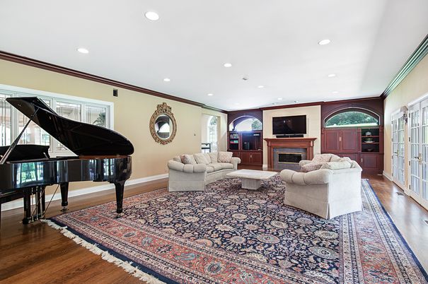Fireplace, Interior, Living room, Piano, Recessed Lighting, Wood Texture Flooring