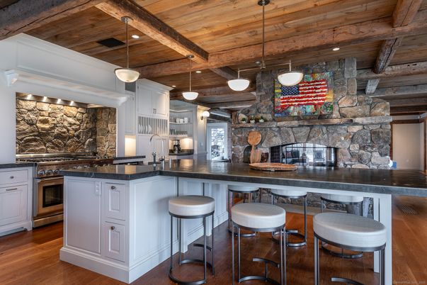 Fireplace, Interior, Kitchen, Pendant Lights, Recessed Lighting, Stainless Steel Appliances, Stone Walls, Wooden Beams, Wooden Ceilings, Wood Texture Flooring