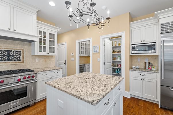 Chandelier, Interior, Kitchen, Recessed Lighting, Stainless Steel Appliances, Wood Texture Flooring