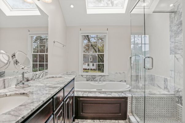 Bathroom, Dual Sink Vanities, Glass Shower, Interior, Marble Walls, Recessed Lighting
