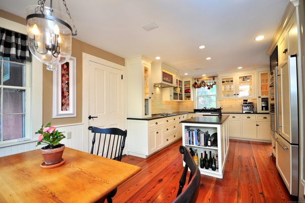 Dining room, Interior, Kitchen, Recessed Lighting, Stainless Steel Appliances, Wood Texture Flooring