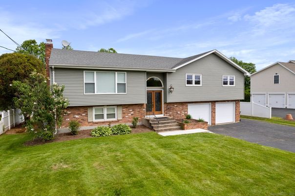 Attached, Exterior, Facade, Brick Facade, Raised Ranch