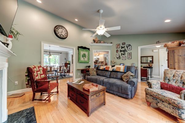 Dining room, Fireplace, Interior, Living room, Recessed Lighting, Wood Texture Flooring