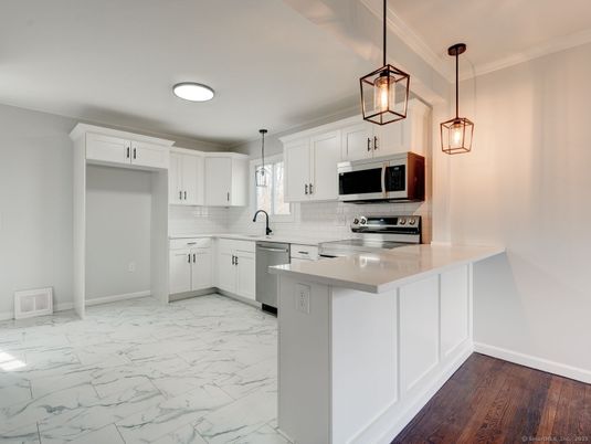 Interior, Kitchen, Marble, Pendant Lights, Stainless Steel Appliances, Wood Texture Flooring