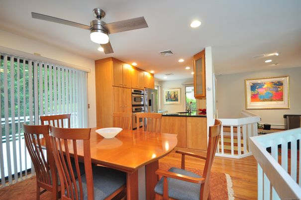 Dining room, Interior, Kitchen, Recessed Lighting, Stainless Steel Appliances, Wood Texture Flooring