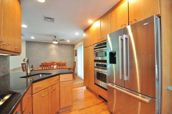 Dining room, Interior, Kitchen, Recessed Lighting, Stainless Steel Appliances, Wood Texture Flooring