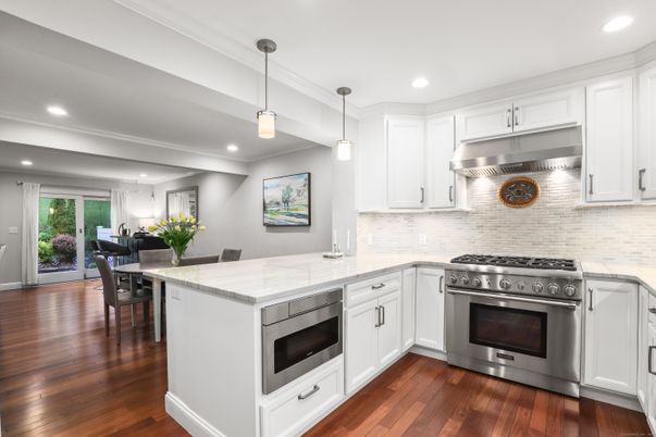 Dining room, Interior, Kitchen, Pendant Lights, Recessed Lighting, Stainless Steel Appliances, Wood Texture Flooring