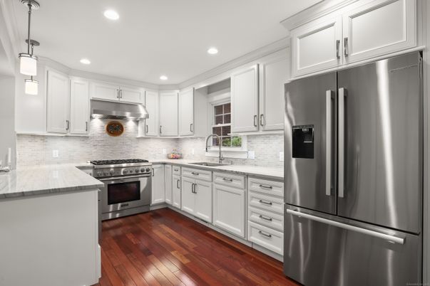 Interior, Kitchen, Pendant Lights, Recessed Lighting, Stainless Steel Appliances, Wood Texture Flooring
