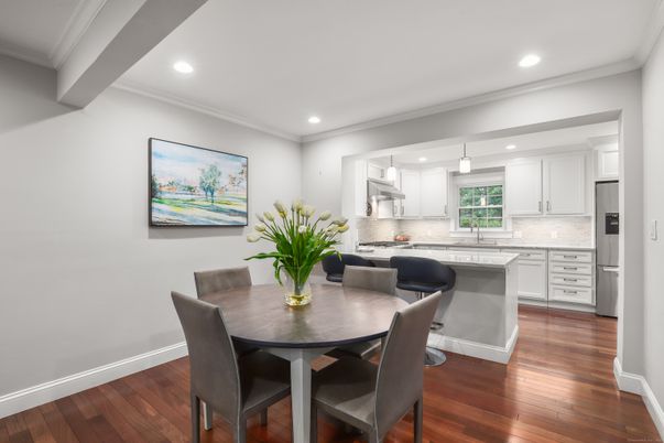 Dining room, Interior, Kitchen, Pendant Lights, Recessed Lighting, Stainless Steel Appliances, Wood Texture Flooring