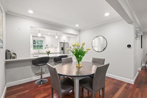Dining room, Interior, Kitchen, Pendant Lights, Recessed Lighting, Stainless Steel Appliances, Wood Texture Flooring