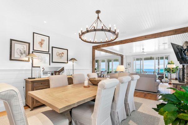 Chandelier, Dining room, Fireplace, Interior, Living room, Recessed Lighting, Water, Wood Texture Flooring