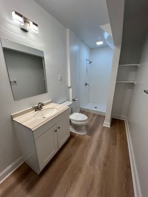 Bathroom, Dual Sink Vanities, Interior, Recessed Lighting, Wood Texture Flooring