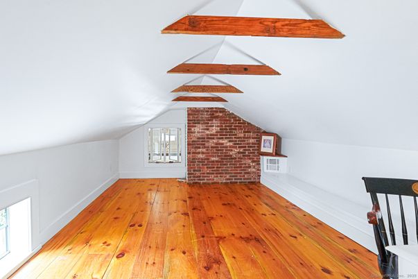 Empty room, Fireplace, Interior, Stone Walls, Wooden Beams, Wood Texture Flooring