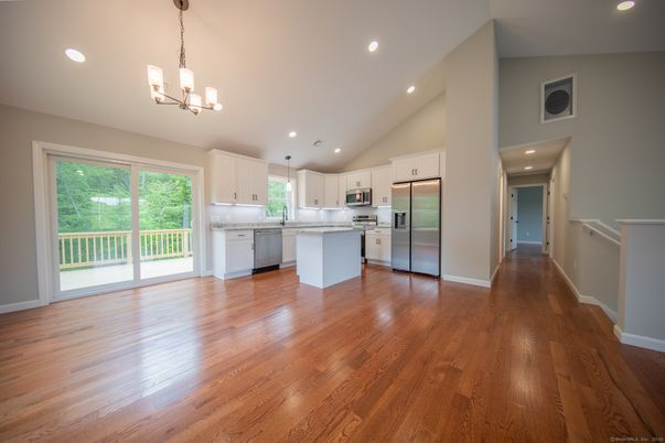 Chandelier, Interior, Kitchen, Pendant Lights, Recessed Lighting, Stainless Steel Appliances, Wood Texture Flooring