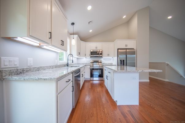 Interior, Kitchen, Recessed Lighting, Stainless Steel Appliances, Wood Texture Flooring