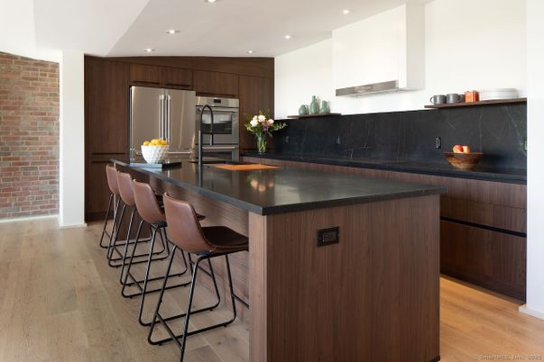 Interior, Kitchen, Recessed Lighting, Stainless Steel Appliances, Stone Walls, Wood Texture Flooring